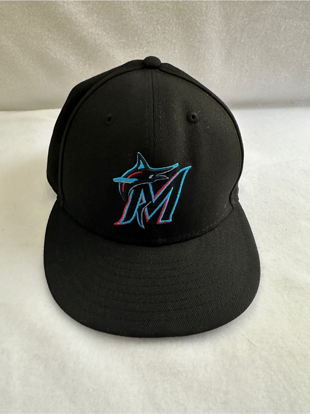 New Era Black Miami Marlins Fitted Cap with Teal and Red Logo